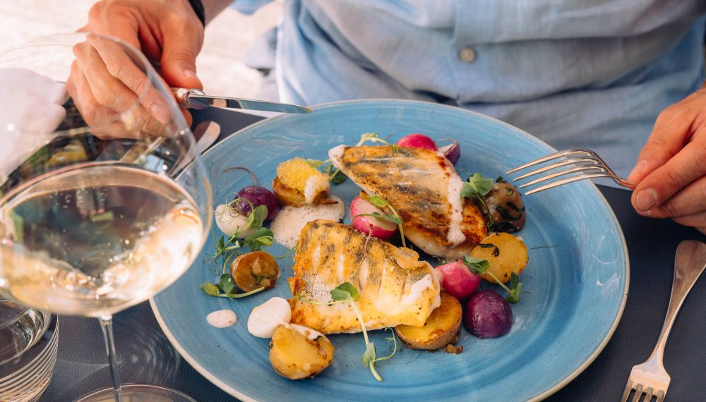 Exklusives Fischgericht im Restaurant am Wolfgangsee im Adults Only Boutique Hotel Cortien am See